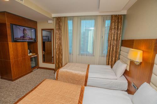 Deluxe Üç Kişilik Oda