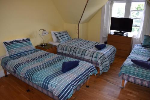Üç Kişilik En-Suite Banyolu Oda