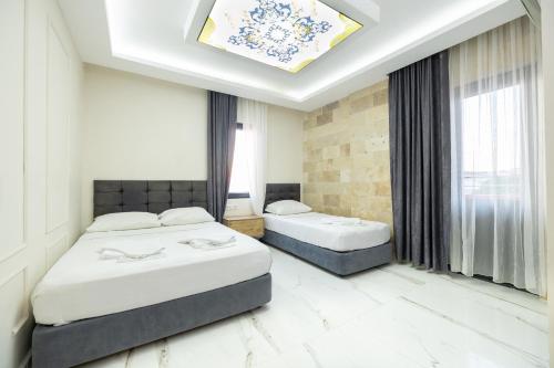 Üç Kişilik Oda