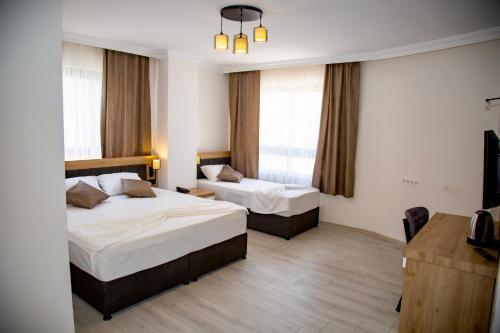 Deluxe Üç Kişilik Oda