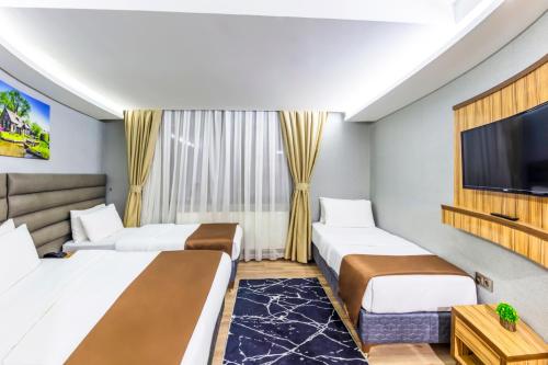 Deluxe Dört Kişilik Oda