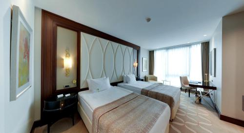 Premium İki Tek Kişilik Yataklı Oda