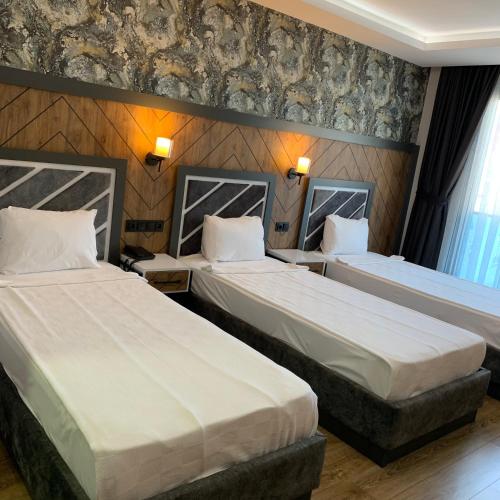 Deluxe Üç Kişilik Oda