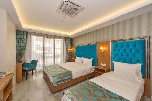 Deluxe Üç Kişilik Oda