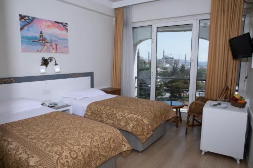 Çift Kişilik Oda - Balkonlu ve Deniz Manzaralı
