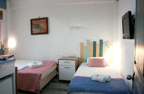Ekonomik Dört Kişilik Oda - Ortak Banyolu