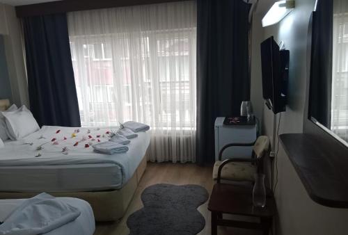 Üç Kişilik Oda
