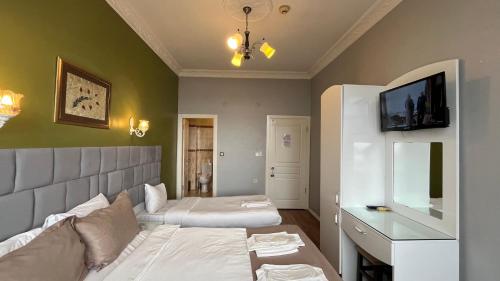 Deluxe Üç Kişilik Oda - Deniz Manzaralı