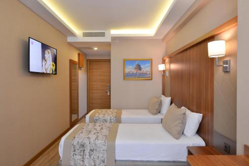 Deluxe Double Room - İki Çift Kişilik Yataklı