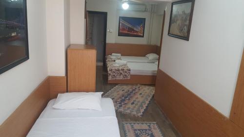 Üç Kişilik Oda
