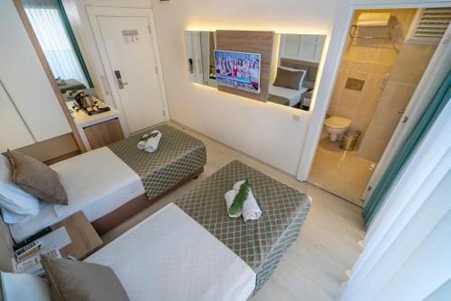 Standard Double/Two-Bedroom Room - With Balcony