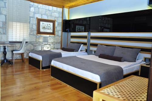 Deluxe Üç Kişilik Oda