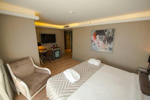 Deluxe Çift Kişilik veya İki Yataklı Oda - Kısmi Deniz Manzaralı