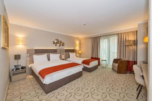 Deluxe Üç Kişilik Oda