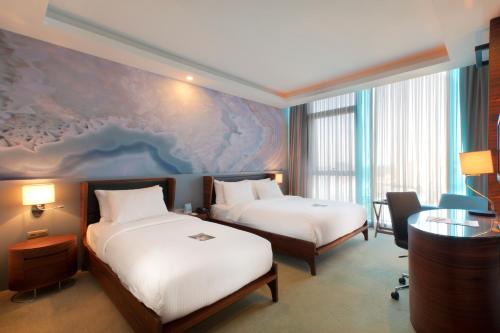 Deluxe Triple Room with One Double Bed and One Single Bed