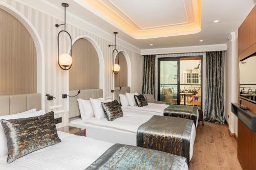 Üç Kişilik Oda - Balkonlu - Bodrum