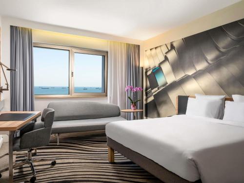Superior Queen Room with Sofa and Sea View