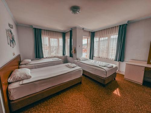 Standart Üç Kişilik Oda - Banyolu