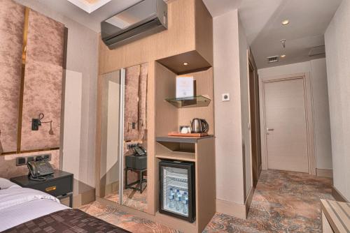 Superior Room with One King Bed and One Single Bed with Balcony and View