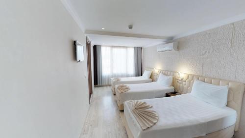 Triple Room - Garden View
