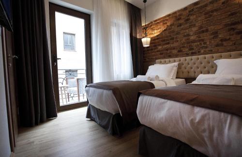 Deluxe Triple Room with Balcony
