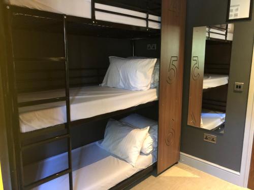 Bed in 12-Bed Mixed Dormitory Room with Shared Bathroom