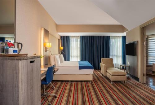 Suite - 1 King Bed, 1 Sofa Bed (Smoking)