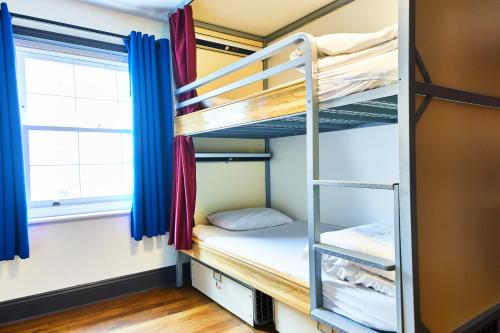 Bed in 14-Bed Female Dormitory Room with External Shared Bathroom