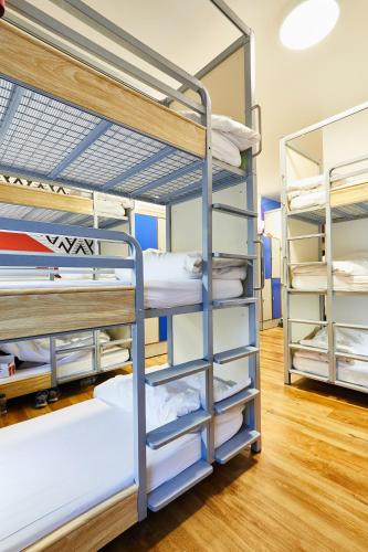 Bed in 21-Bed Mixed Dormitory Room with Triple Bunks and External Shared Bathroom