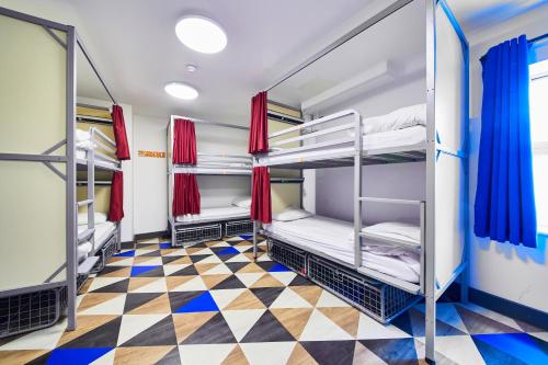 Bed in 10-Bed Female Dormitory Room with External Shared Bathroom