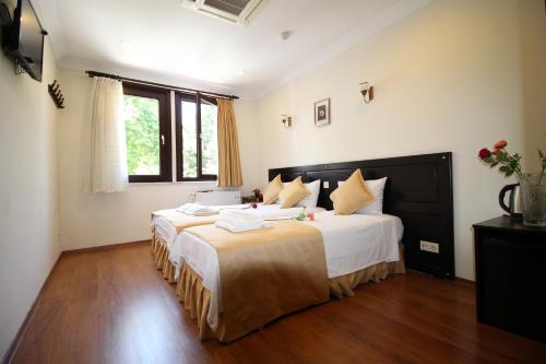Triple Room - Garden View