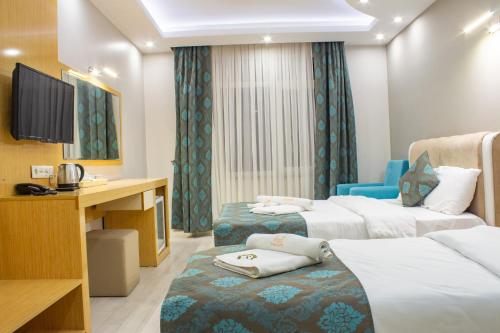 Deluxe Triple Room