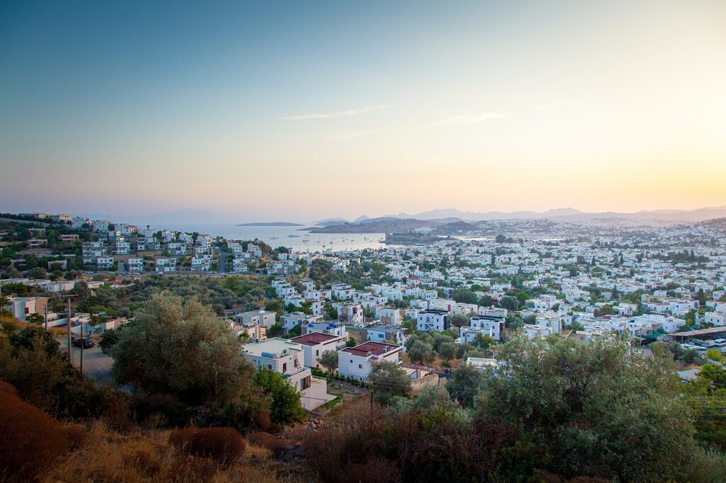 Bodrum's white houses and bay at sunset