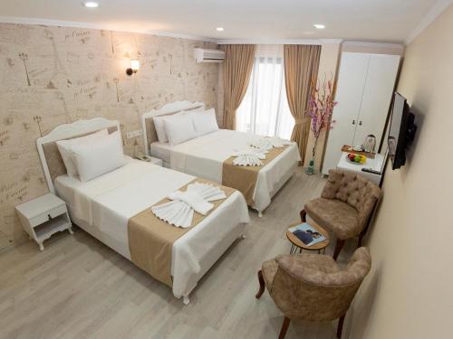 Deluxe Üç Kişilik Oda