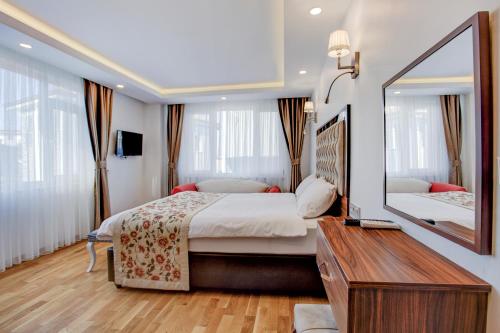 Deluxe Üç Kişilik Oda