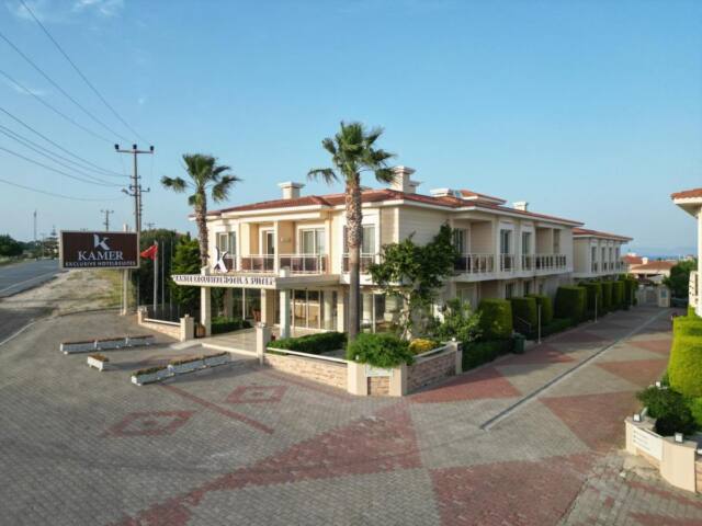 Kamer Suite & Hotel