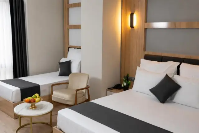 Deluxe Üç Kişilik Oda
