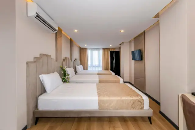 Deluxe Triple Room