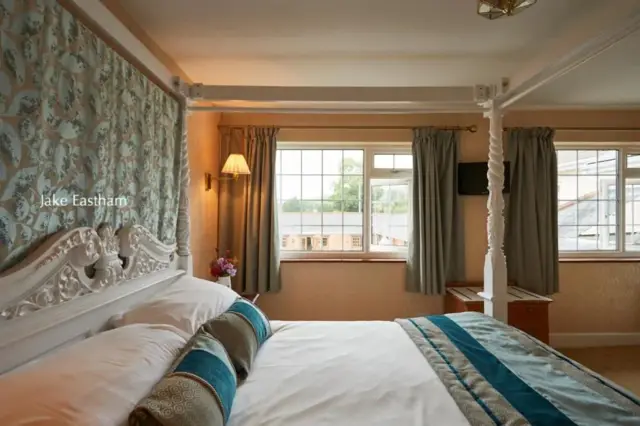 Room with Four-Poster Bed