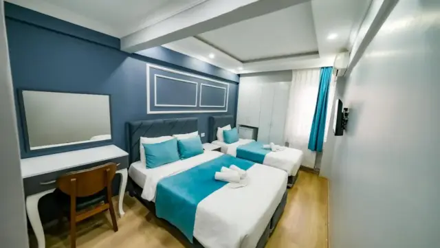 Deluxe Üç Kişilik Oda