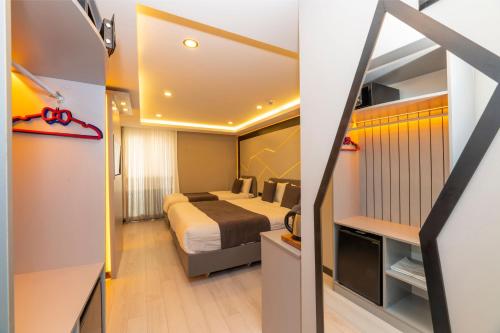 Deluxe Üç Kişilik Oda